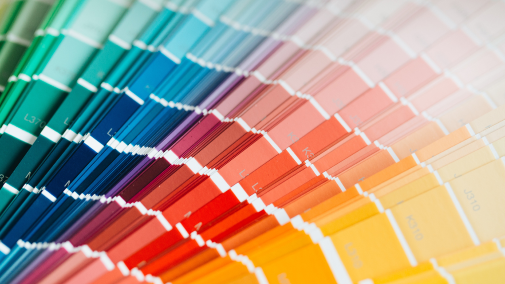 Paint sample swatches in an array of colors to examine the role of color psychology in design